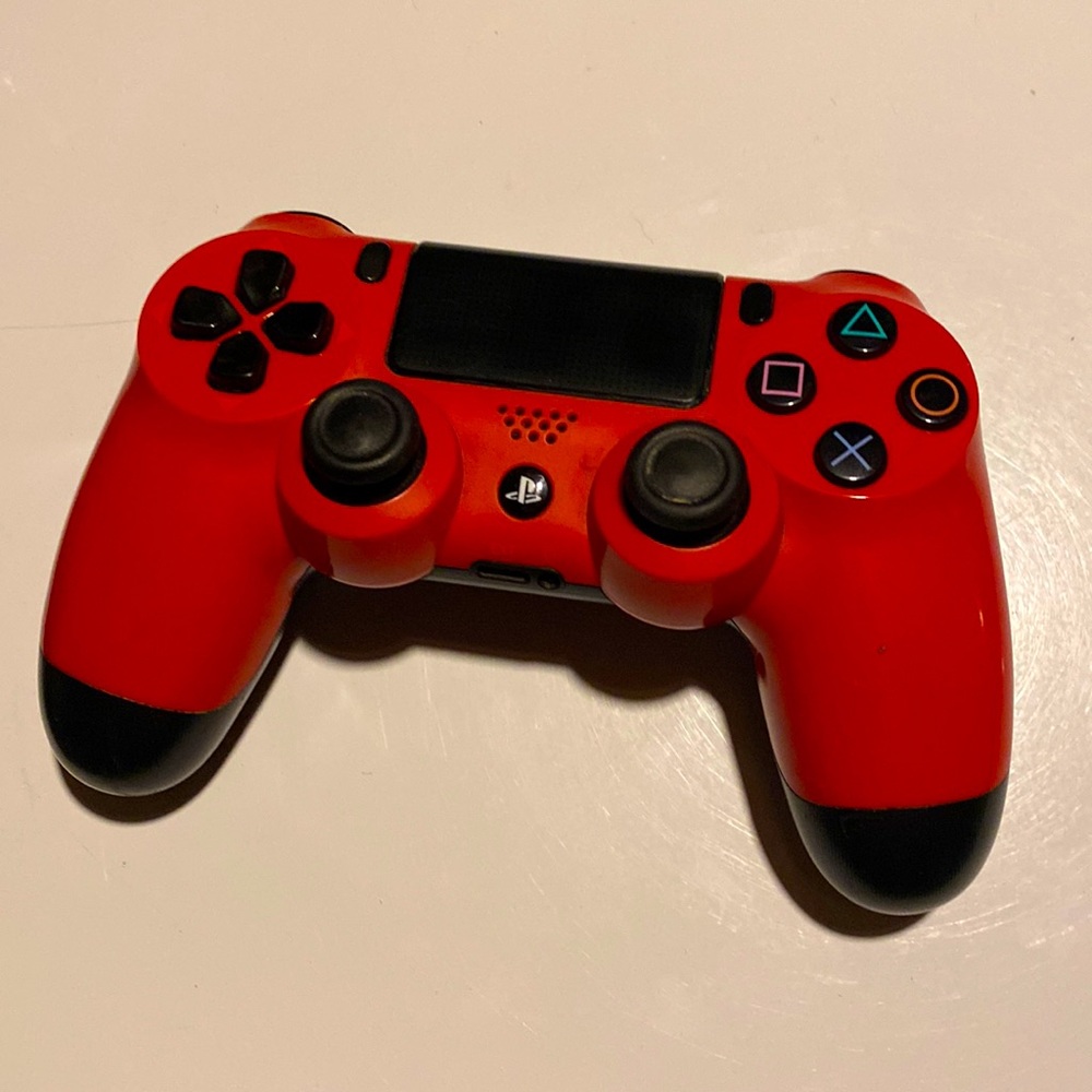 Sony PlayStation 4 controller in red